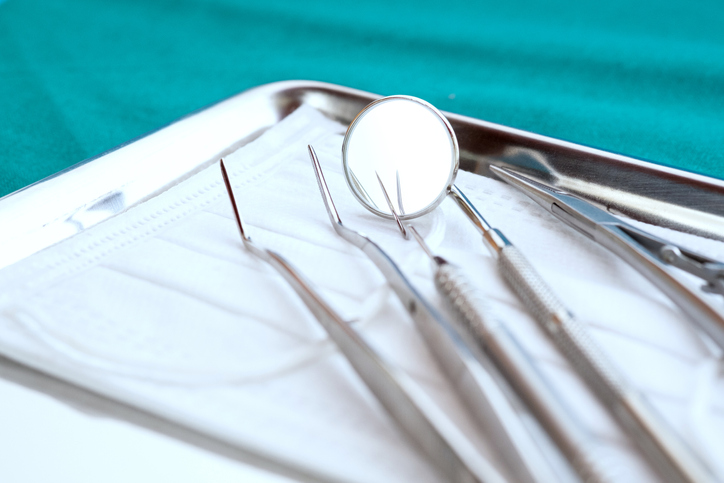 Close up, Professional tools of dentist on stainless steel tray.