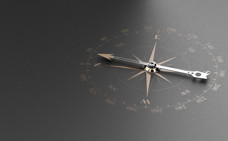 Golden compass over modern black background. Concept of business guidance or orientation, 3D illustration.