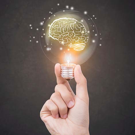 lightbulb brainstorming creative idea abstract icon on business hand. lightbulb brainstorming creative idea abstract icon on business hand.