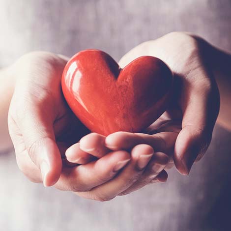 woman holding red heart, health insurance, donation charity concept