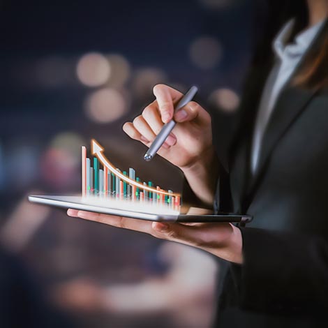 Businessman holding tablet and have a chart showing business growth. positive indication of income.