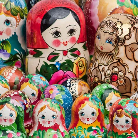 Large group of typical russian nesting dolls, Matryoshka dolls, full frame multicolored image.
