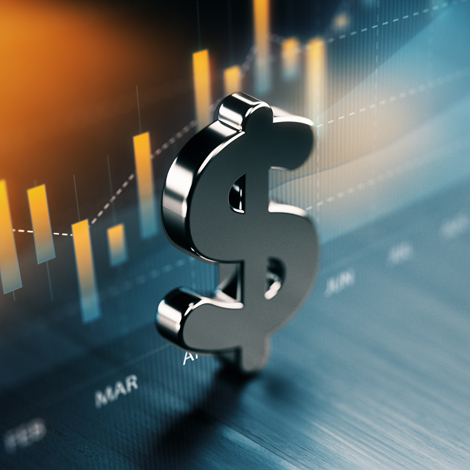 Cybersecurity-Service-Investments American dollar symbol standing on wood surface in front of a graph