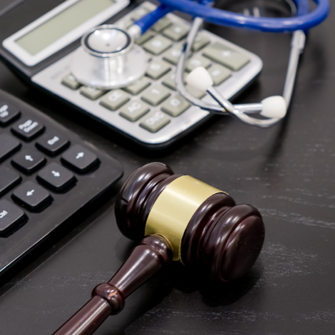 SharmilaChatterjee-WorkWith Gavel stethoscope and calculator