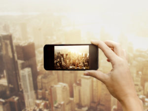 Woman photographing New York City