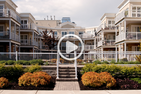 Apartment complex with a play button