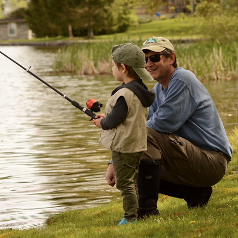 Scott Hagaman with grandson fishing at the lake