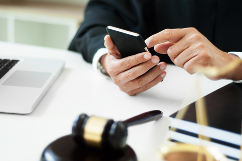 lawyer on their phone in a court office