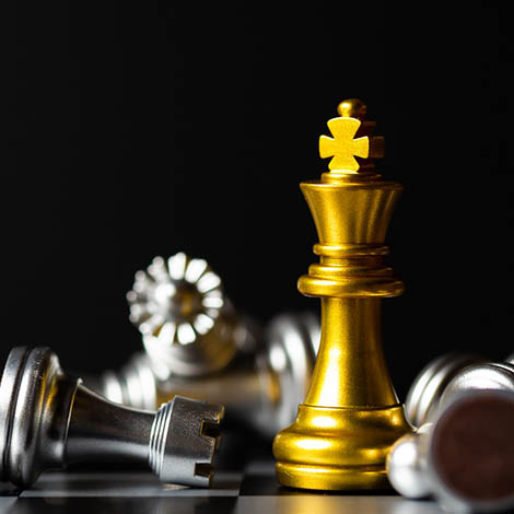 Chess board game for ideas and competition and strategy, business success concept. gold and silver chess pieces