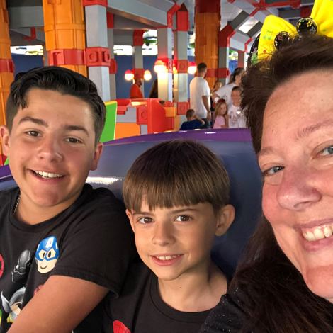 Amanda at Disney World with nephews