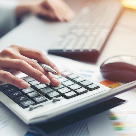 Woman working with a calculator