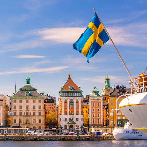 Boat with a Swedish flag on a lake