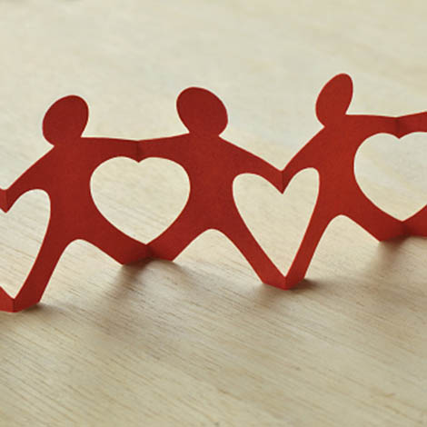 Paper people chain with hearts - Teamwork and love concept