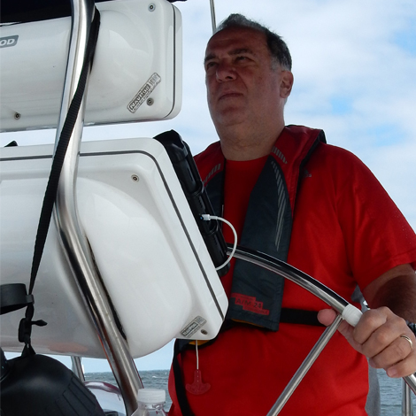 Sal Ambrosino driving a boat