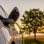 Electric vehicle being charged