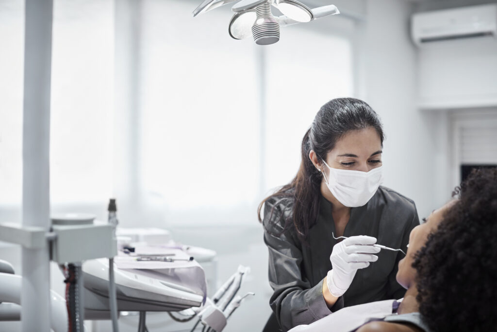 Dentist with a patient