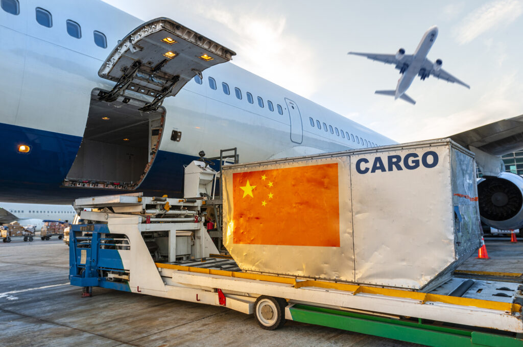 Loading the container in the cargo airplane.