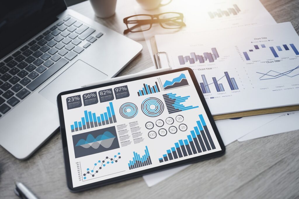 Digital Business Analysis,Growth Data and Charts on Desktop Computer Screen in Modern Office