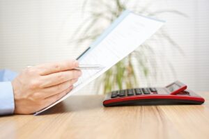businessman is reading and checking contract