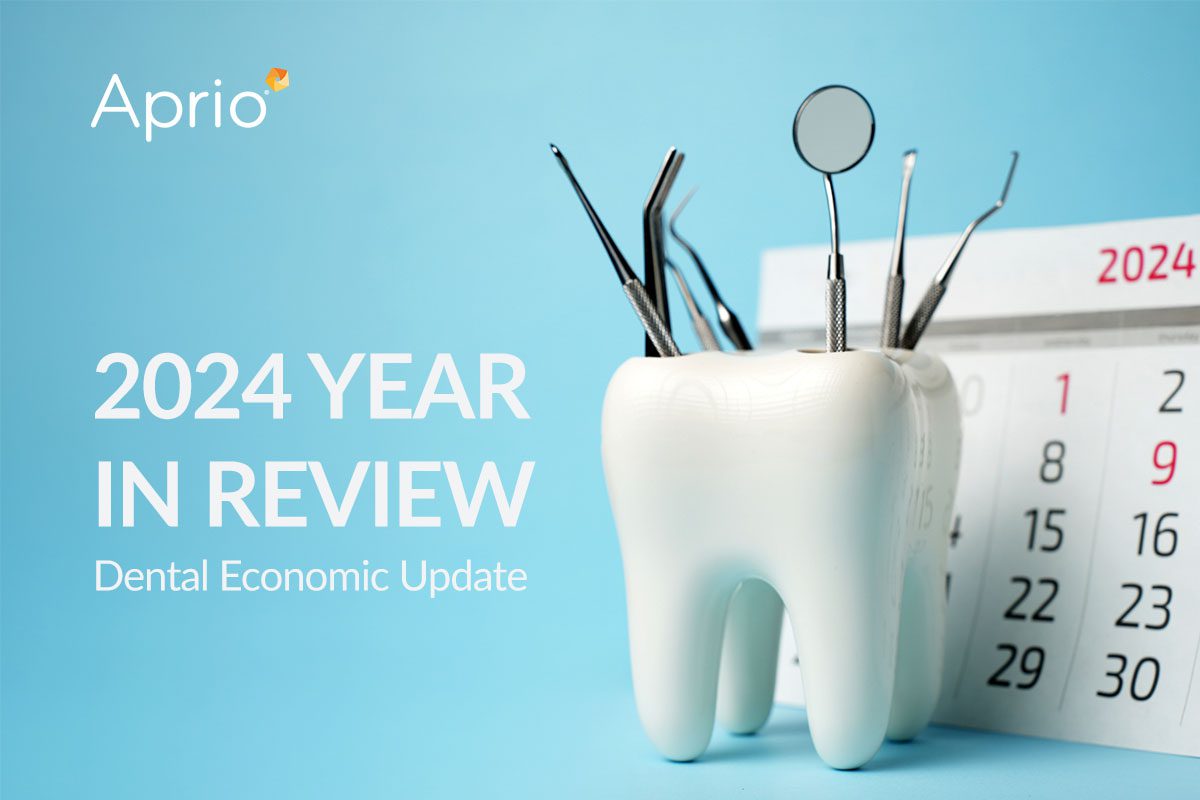 Dental tools sit in a tooth-shaped instrument holder in front of a calendar beside text reading 