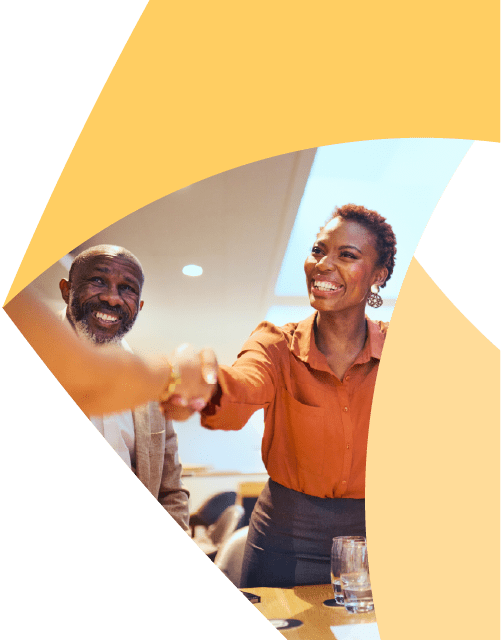 In the corner of the Aprio pinwheel logo, a woman shakes hands with someone out of frame while another man watches