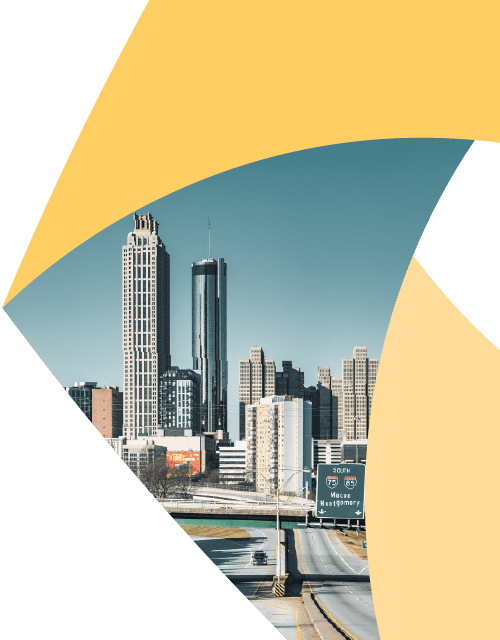 In the corner of the Aprio logo, a city skyline towers over a stretch of highway