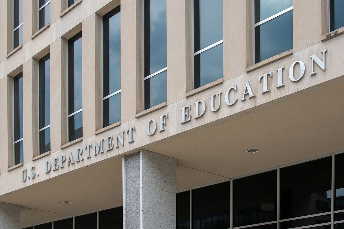 Exterior view of the U.S. Department of Education building, showing its name in large letters above the entrance.