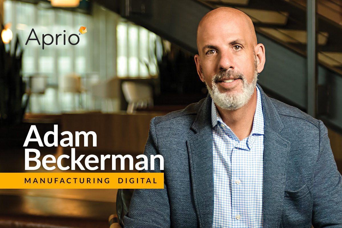 A man in a blue blazer sits indoors, smiling at the camera. Text reads Aprio and Adam Beckerman Manufacturing Digital.