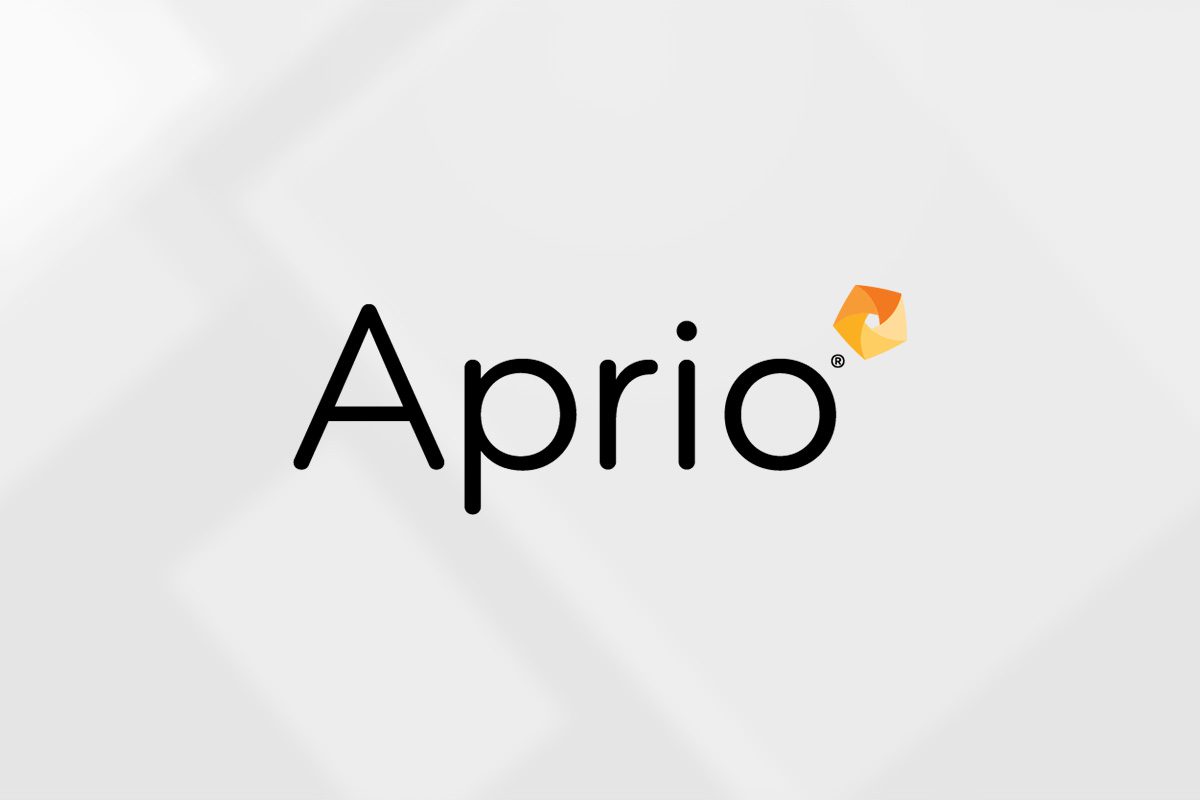 The image shows the Aprio logo, featuring the word Aprio in black text with an orange geometric shape above the letter i on a light gray background.