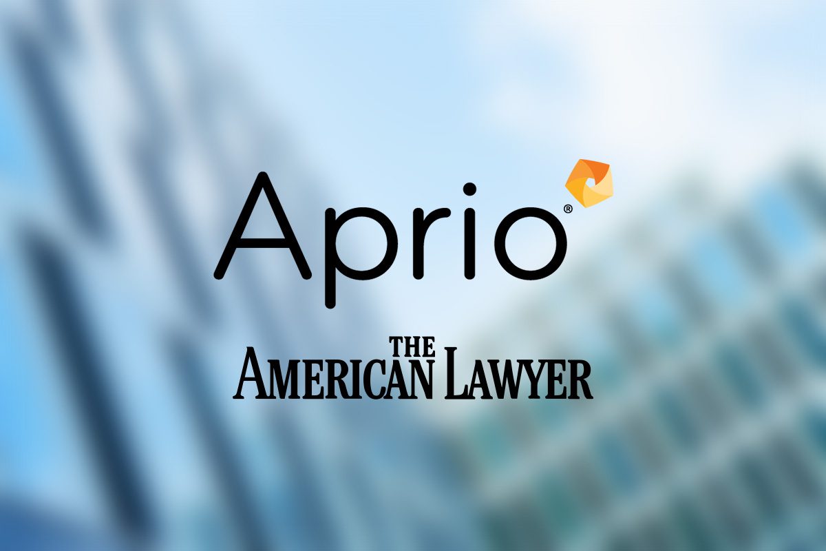 The image features the Aprio logo above the logo for The American Lawyer, set against a blurred background of a modern glass building.