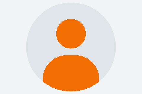 An orange generic user icon with a circular head and shoulders on a light gray background.