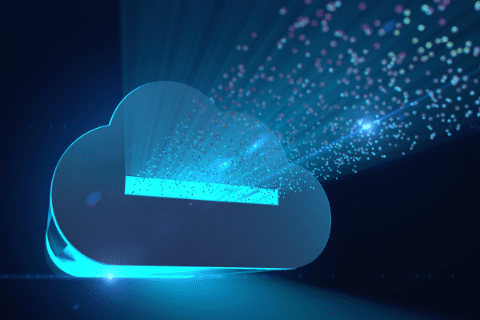 A digital cloud icon with glowing particles and beams of light emerging from it, against a dark background, symbolizing cloud computing or data storage.