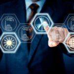 A person in a business suit touches virtual icons representing renewable energy sources, including solar and wind power, on a digital interface.