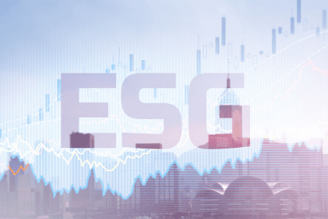 Large translucent letters ESG overlay a cityscape, with financial charts and graphs superimposed above the skyline, symbolizing environmental, social, and governance investment trends.