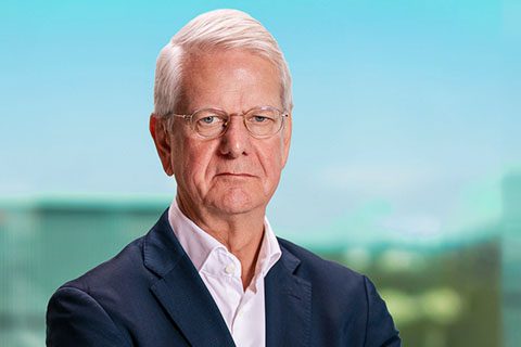 Man in glasses and a black blazer