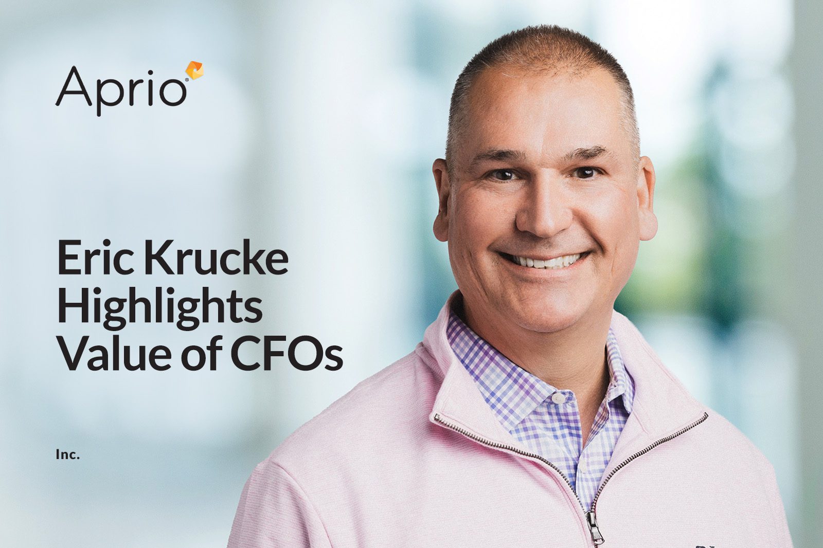 Smiling man in a pink sweater stands in front of a blurred background; text reads, Eric Krucke Highlights Value of CFOs with Aprio logo in the top left.