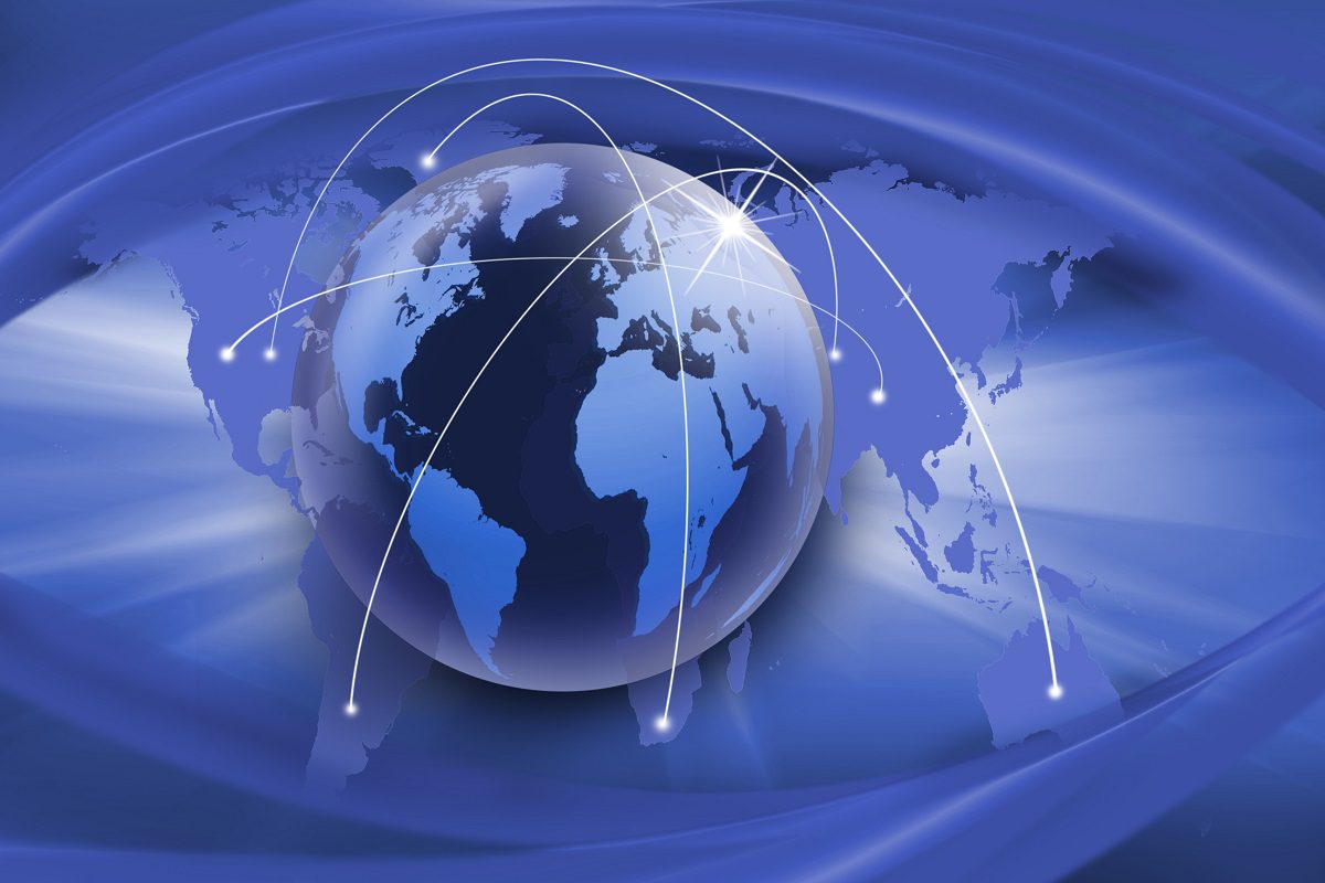 A digital illustration of Earth with white lines connecting various points, symbolizing global communication and connectivity, against a blue world map background.