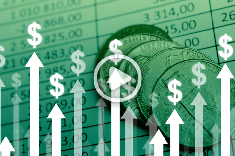 Multiple upward-pointing arrows with dollar signs overlay an image of coins and a financial spreadsheet, suggesting financial growth or profit increase.
