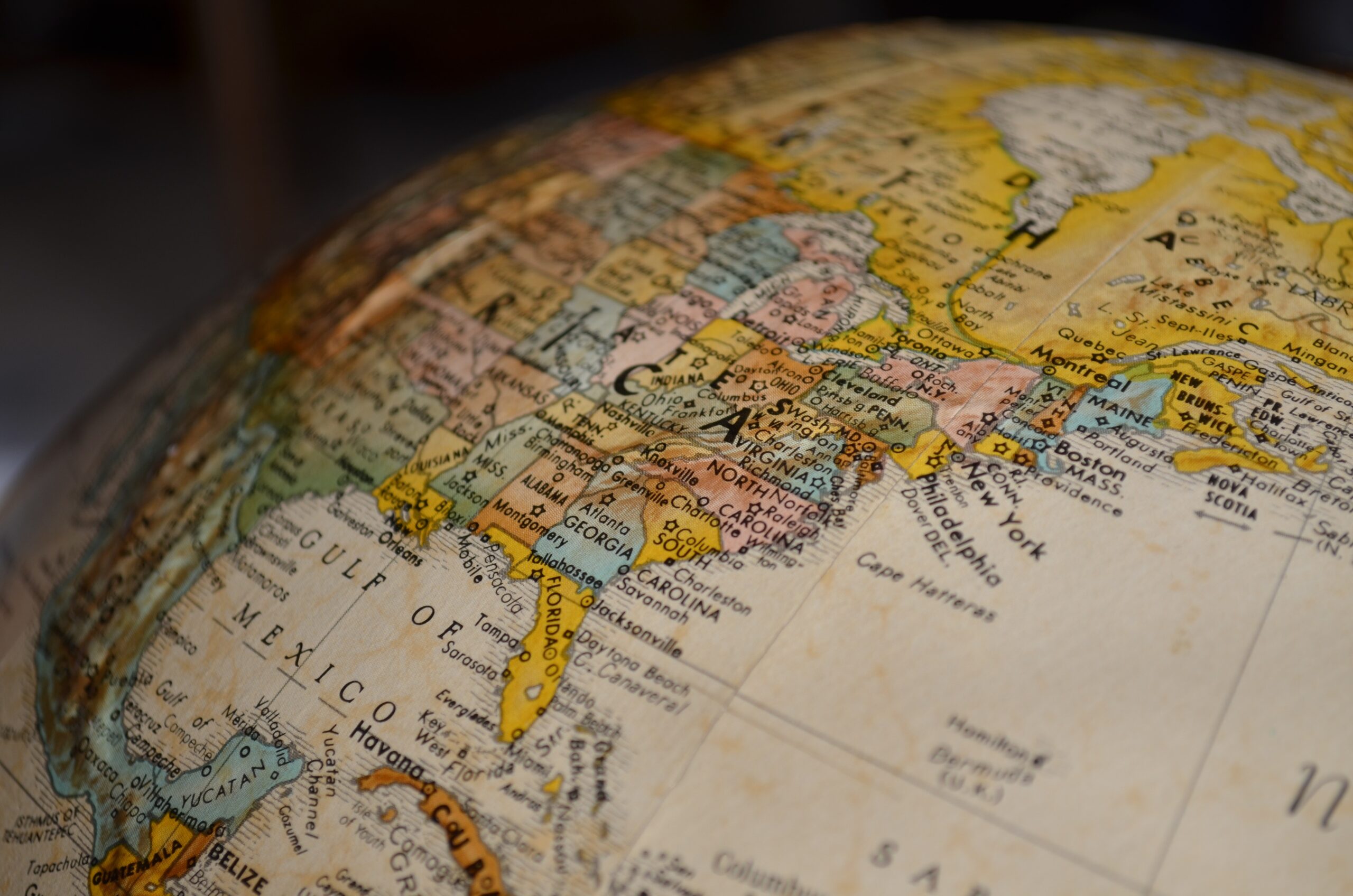 Close-up of a globe showing parts of the United States, Mexico, and Central America, with state and country names clearly visible.