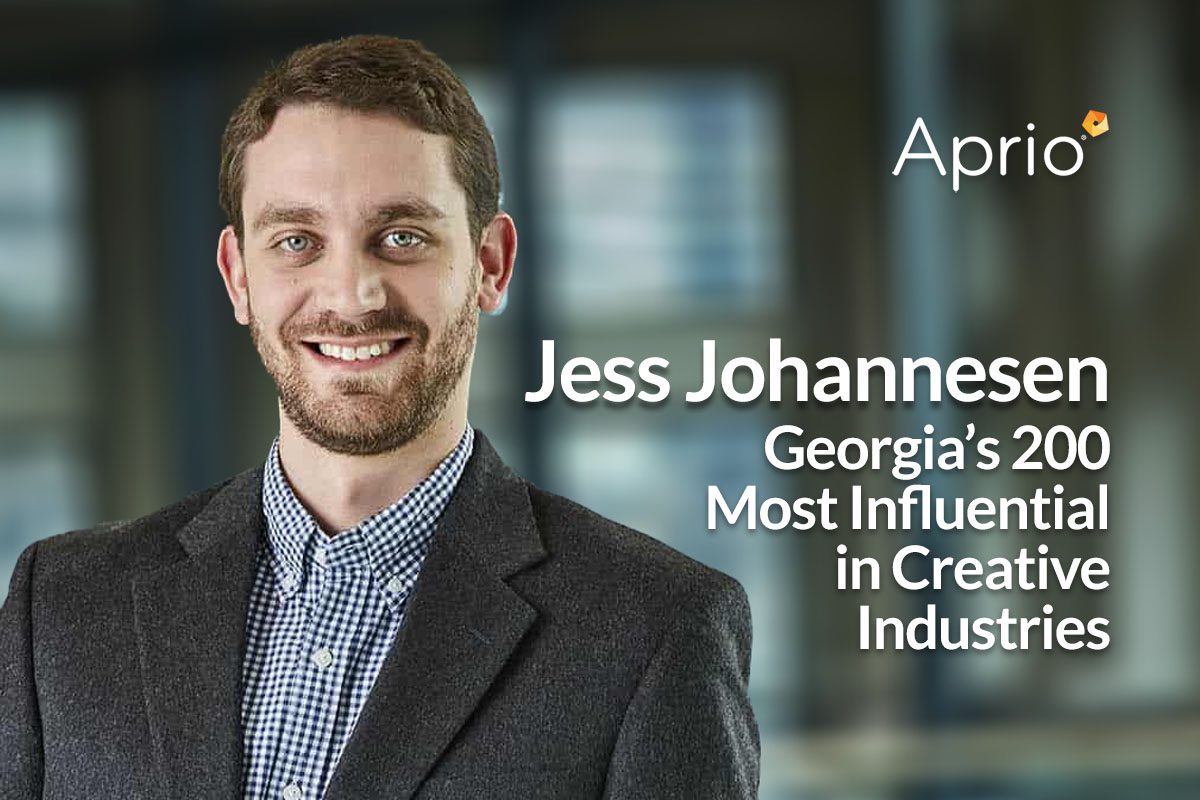 A man in a suit jacket smiles at the camera. Text reads: Jess Johannesen, Georgias 200 Most Influential in Creative Industries, Aprio.