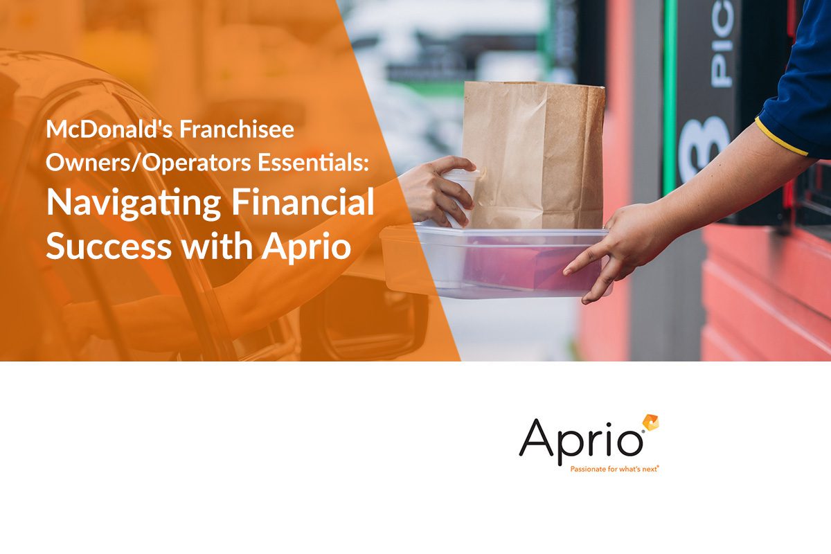 A McDonalds employee hands a paper bag to a customer at a drive-thru; overlay text promotes financial services for franchisees by Aprio.