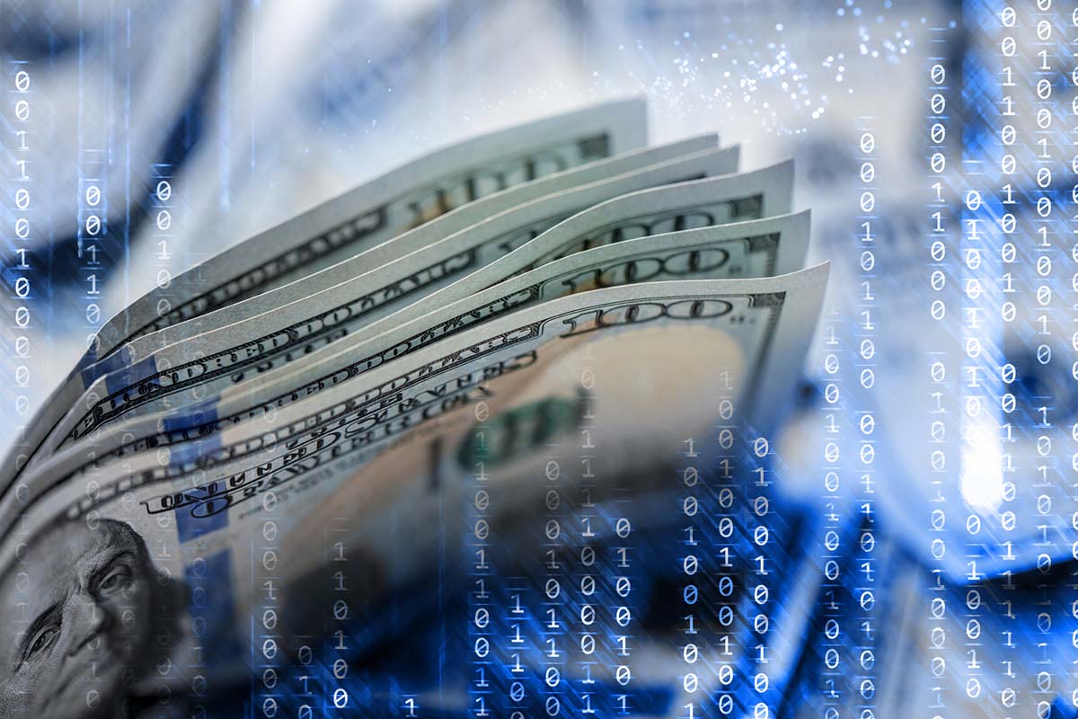 Close-up of several US hundred-dollar bills overlaid with binary code, symbolizing the intersection of finance and digital technology.