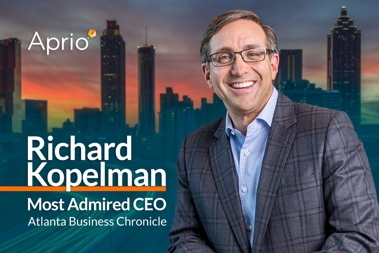 A man in a plaid suit jacket smiles in front of a city skyline backdrop. Text reads: Aprio, Richard Kopelman, Most Admired CEO, Atlanta Business Chronicle.