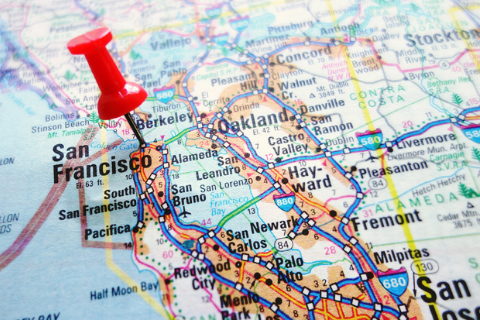 A close-up of a map showing the San Francisco Bay Area with a red pushpin marking the location of San Francisco.