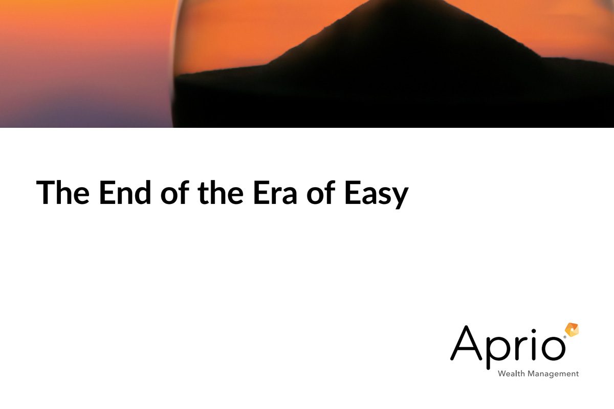 An hourglass with sand and a sunset background above the text The End of the Era of Easy and Aprio Wealth Management logo.