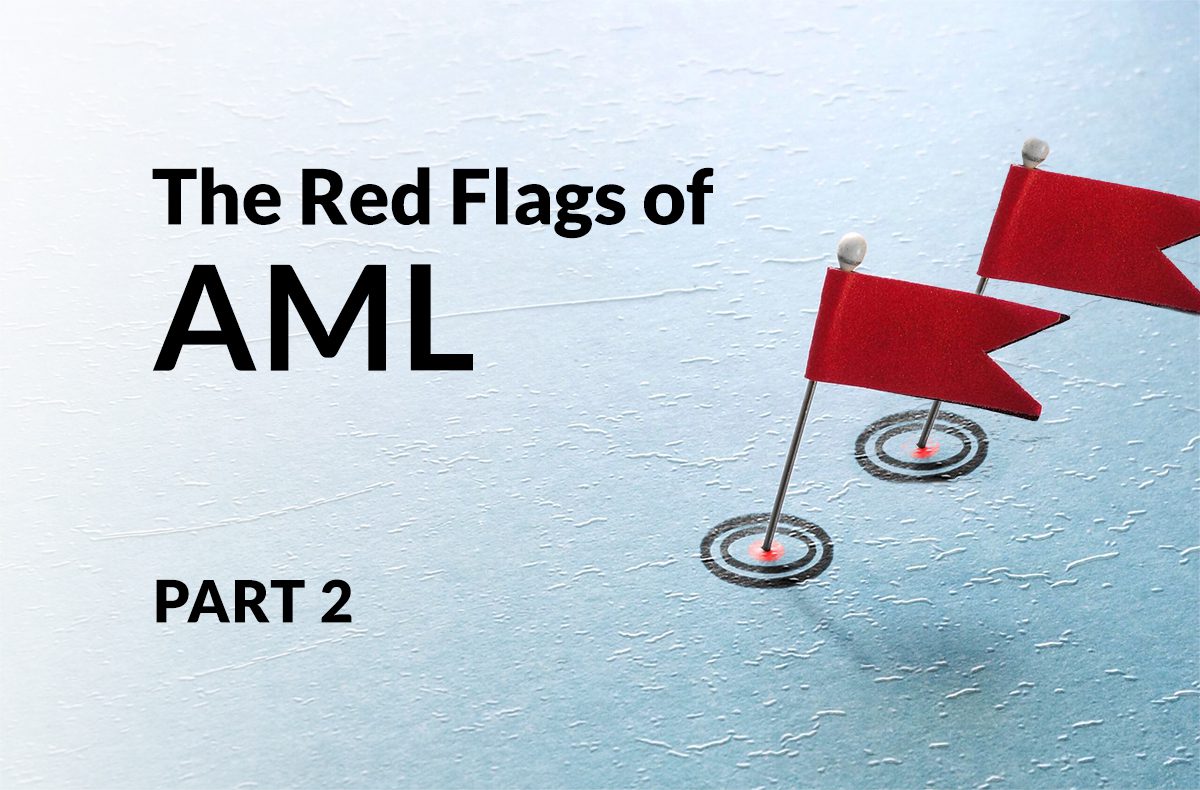 Two red flags on a textured surface with the text The Red Flags of AML PART 2 to illustrate warning signs of anti-money laundering issues.