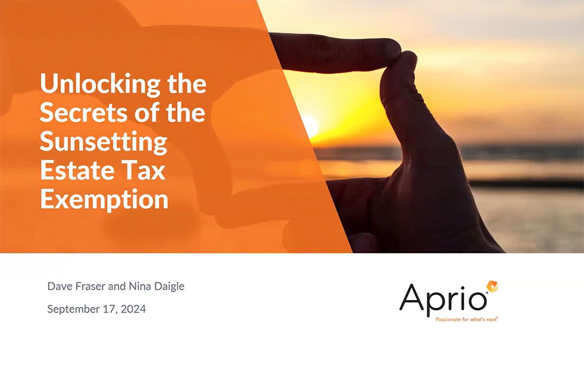 A hand frames the setting sun with seminar details on unlocking the secrets of the sunsetting estate tax exemption, hosted by Aprio on September 17, 2024.