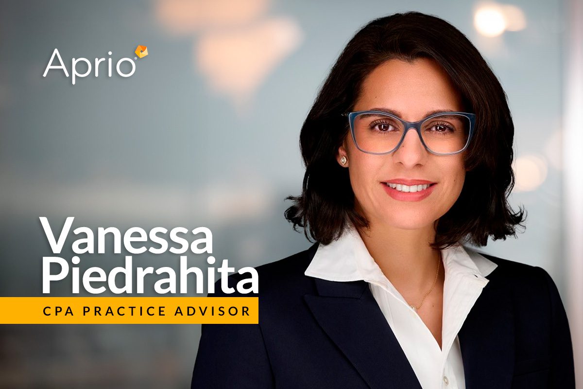 A woman with shoulder-length dark hair and glasses, wearing a navy blazer and white shirt, is smiling. Text reads Vanessa Piedrahita, CPA Practice Advisor, Aprio.