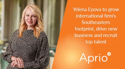 Woman standing indoors beside text announcing Yelena Epova’s role to expand a firm’s Southeastern presence, drive business growth, and recruit top talent for Aprio.