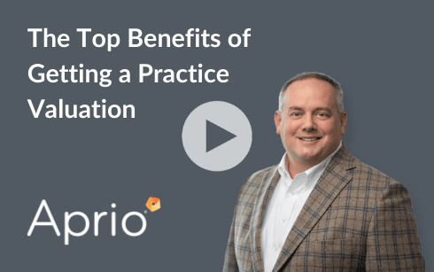 A man in a plaid suit stands next to text reading “The Top Benefits of Getting a Practice Valuation.” Aprio logo and play button on a gray background.